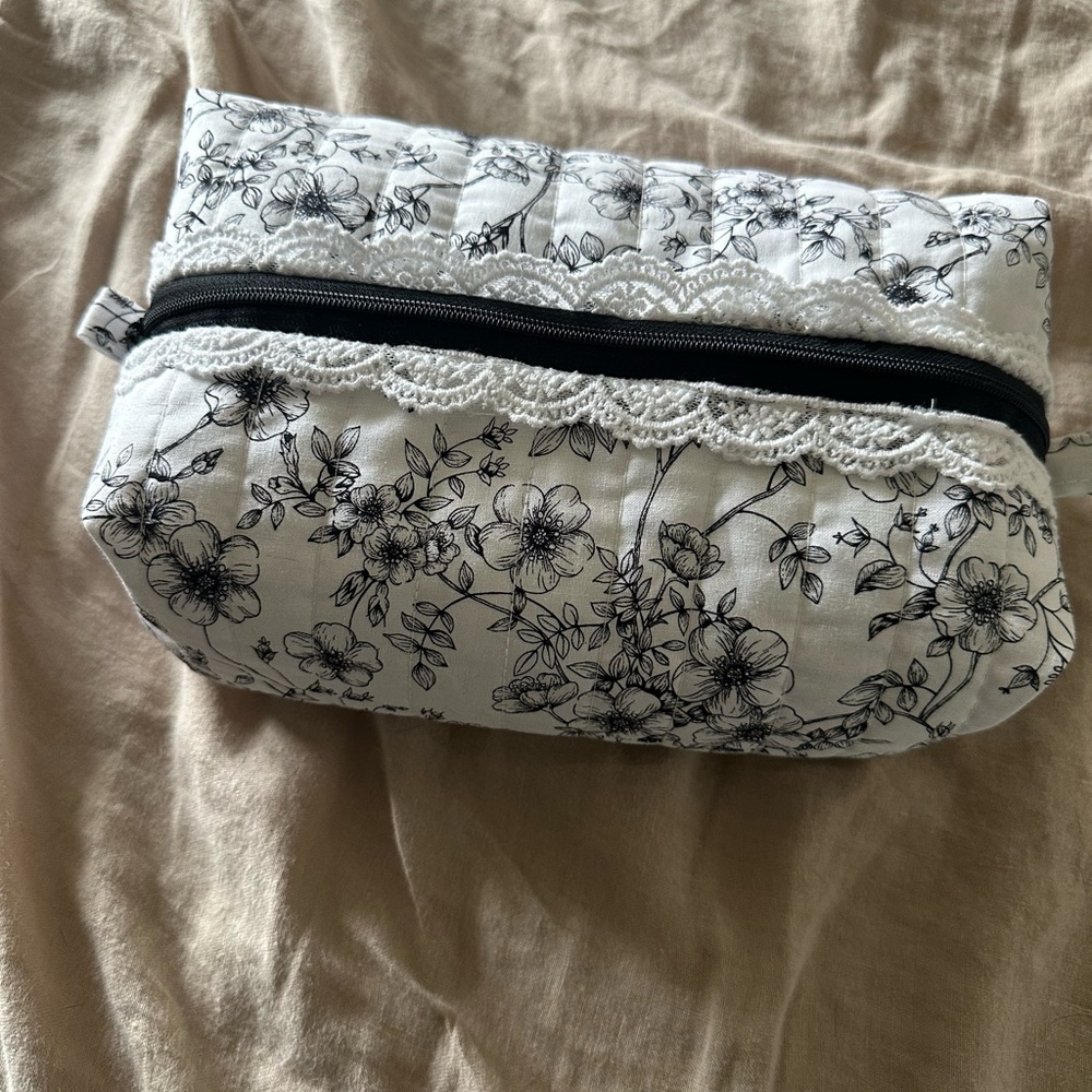 Handmade makeup/toiletries bag. Black and white.